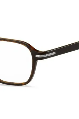 Montura para gafas graduadas de acetato y concha con detalle plateado de la marca